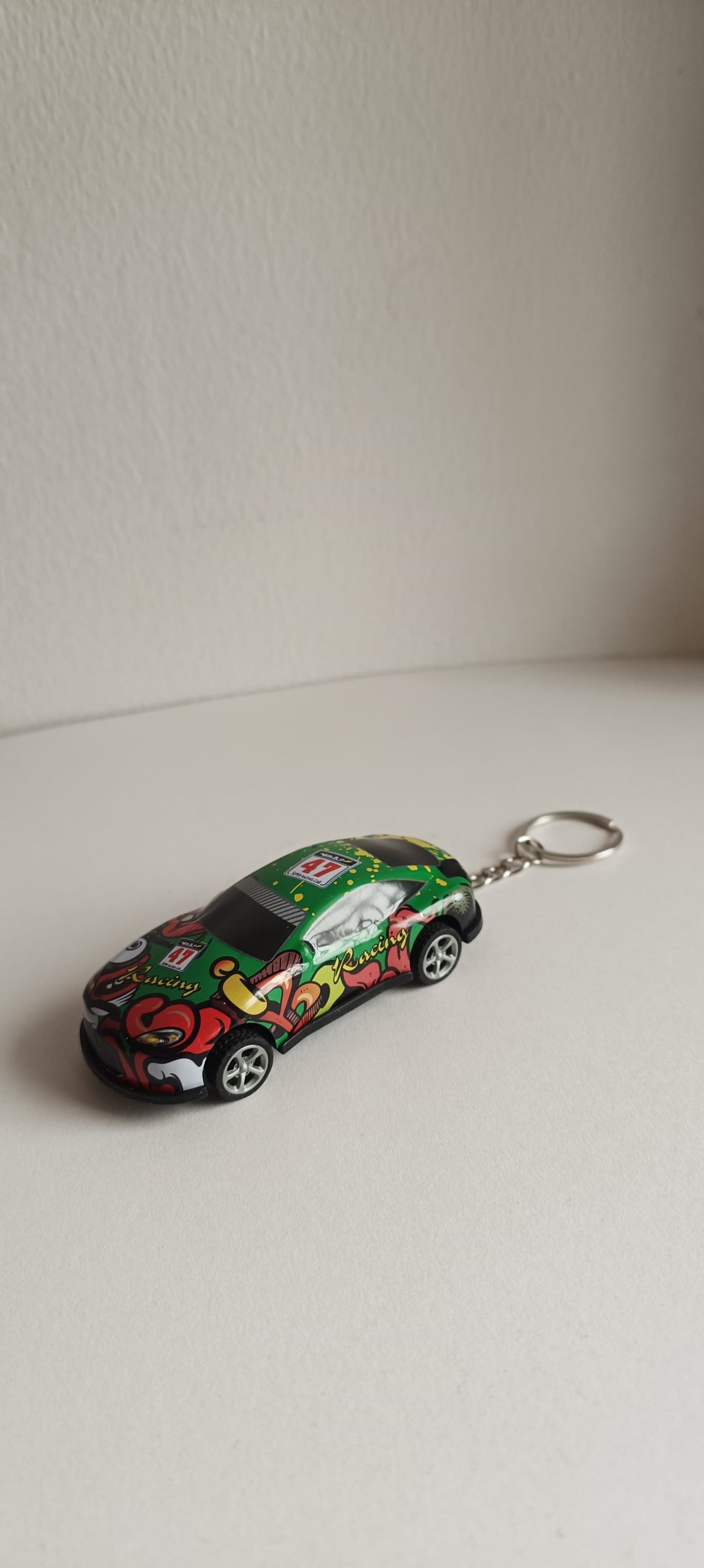 Pull back car keychain